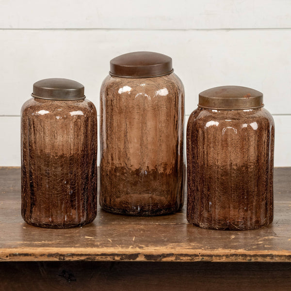 9.75" AMBER GLASS JAR W/ ANTIQUE LID